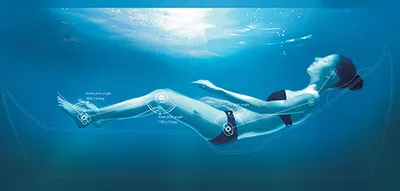 A female submerged in water