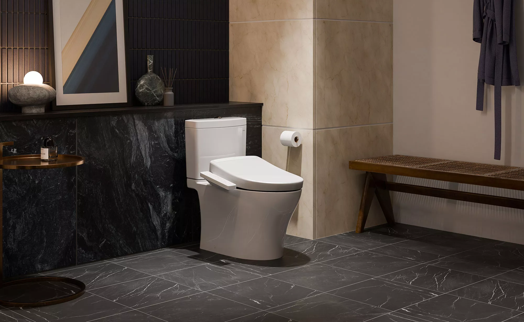 A contemporary bathroom featuring a WASHLET S2 bidet seat against dark stone tile and warm ambient lighting.