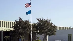 US and Toto flags outside Morrow, GA headquarters