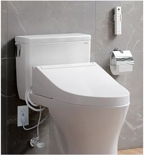 White TOTO WASHLET C5 bidet seat with a convenient wireless remote control
